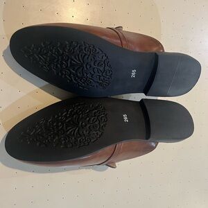 Men slip on casual shoes. Runs a shoe size smaller.
